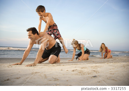 Family at the beach Family at the beach 3317255