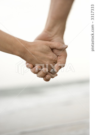 Man and woman holding hands. Man and woman holding hands. 3317333