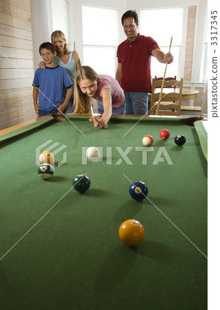 Family Playing Pool in Rec Room Family Playing Pool in Rec Room 3317345