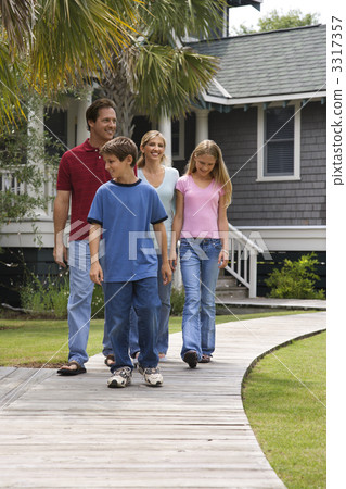 Family of four walking. 3317357