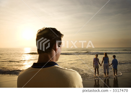 Family at beach. Family at beach. 3317470