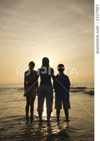 Mom and kids at beach. Mom and kids at beach. 3317487
