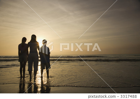 Family at beach. Family at beach. 3317488