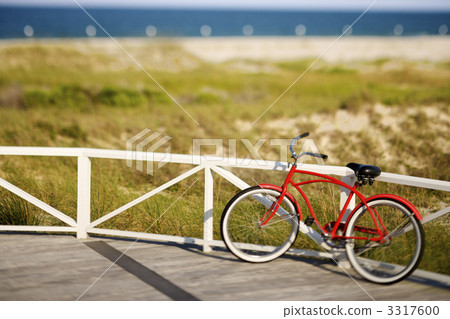 Red beach cruiser bicycle. 3317600