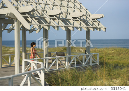 Woman On Arbor Looking at Sea 3318041