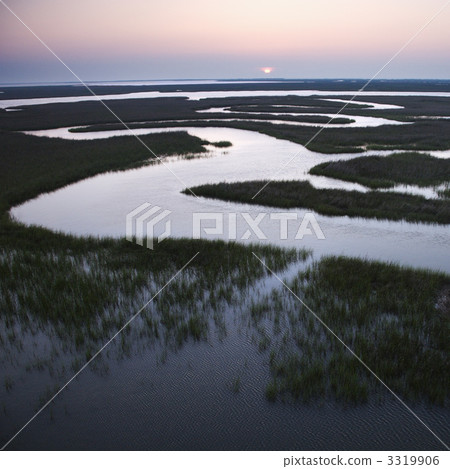 Winding water in marsh. 3319906