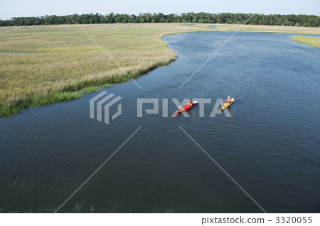 Two boys kayaking. Two boys kayaking. 3320055