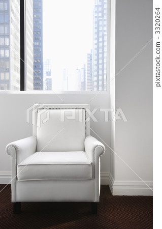White Leather Chair Sitting and a Window 3320264