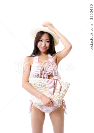 A young woman in a bathing suit A young woman in a bathing suit 3333480