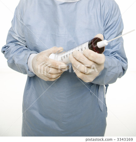Surgeon holding giant needle. 3343169