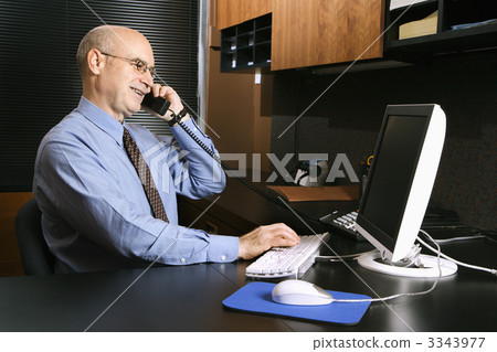 Businessman on cellphone. 3343977