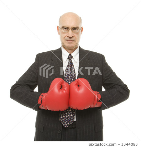 Businessman boxing gloves. 3344083