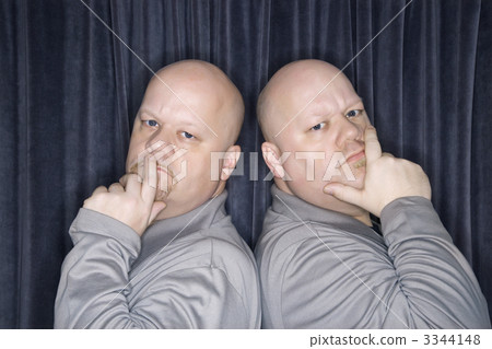 Identical twin men. Identical twin men. 3344148