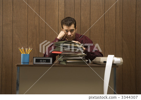 Overworked businessman. Overworked businessman. 3344307