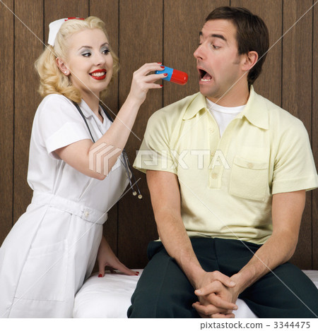 Nurse giving patient pill. Nurse giving patient pill. 3344475