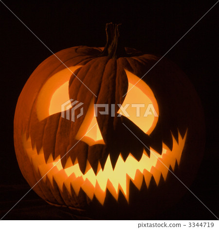 Glowing jack-o-lantern. Glowing jack-o-lantern. 3344719