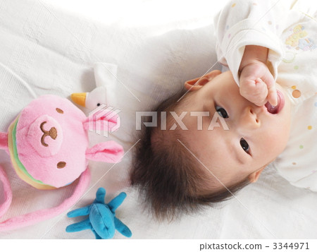Baby sucking with educational goods and fingers 3344971