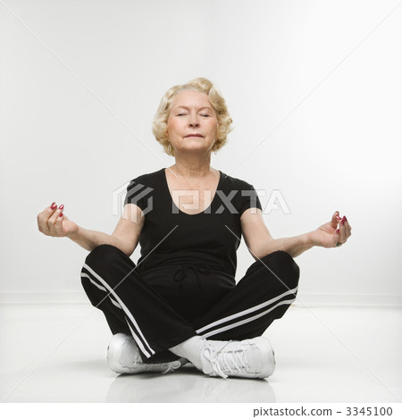 Senior woman meditating. 3345100