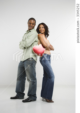 Couple holding valentine heart. 3345252