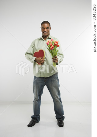 Man holding gifts. 3345256