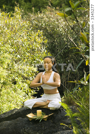 Asian woman meditating. 3345277