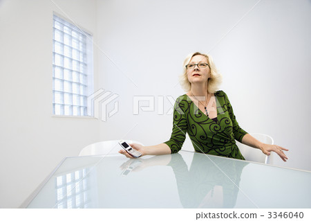 Businesswoman holding cellphone 3346040