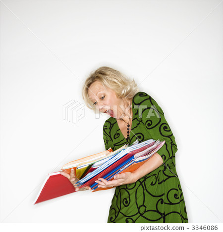Businesswoman dropping folders 3346086