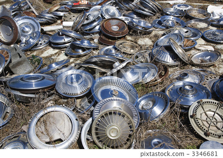 Old hubcaps on ground Old hubcaps on ground 3346681
