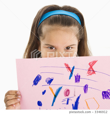 Hispanic girl holding drawing. 3346912