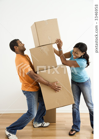 Couple with moving boxes. 3346958