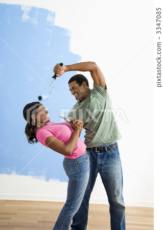 Painting couple playing around. 3347085
