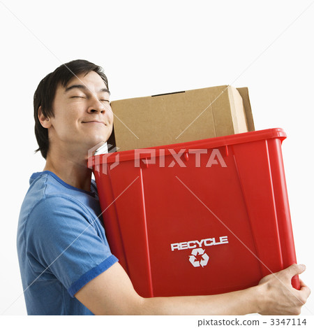 Man holding recycling bin. Man holding recycling bin. 3347114