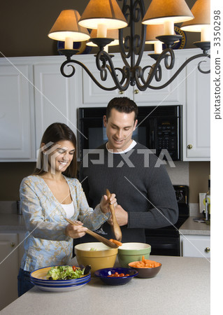 Couple in kitchen. 3350298