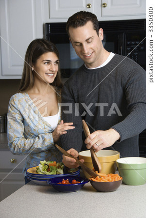 Couple in kitchen. Couple in kitchen. 3350300