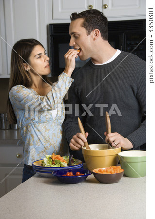 Couple in kitchen. 3350301