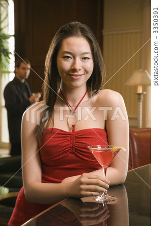 Woman at bar. Woman at bar. 3350391