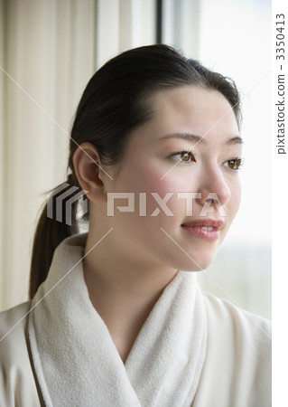 Woman in bathrobe. 3350413
