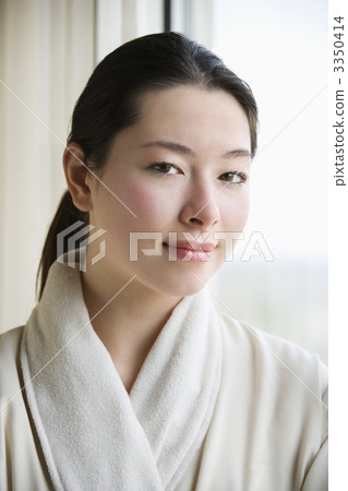 Woman in bathrobe. 3350414