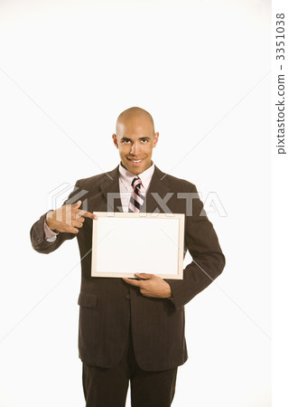 Businessman holding blank sign. Businessman holding blank sign. 3351038