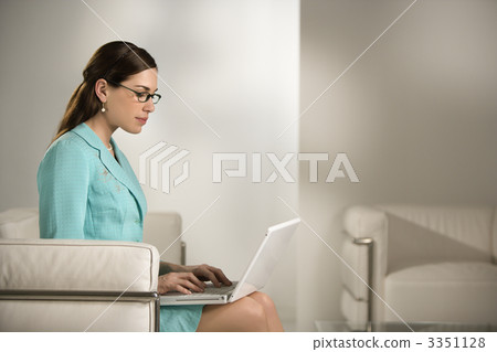 Woman working on laptop. Woman working on laptop. 3351128