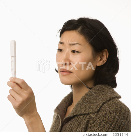 Woman holding pregnancy test. Woman holding pregnancy test. 3351544