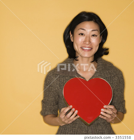 Woman holding heart box. Woman holding heart box. 3351558