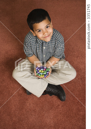Boy holding Easter candy. 3351745