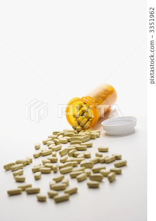 Pills Spilling From Bottle. Isolated 3351962
