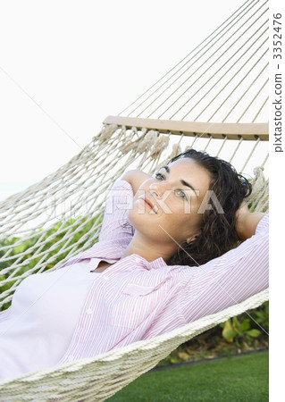 Woman in hammock. Woman in hammock. 3352476
