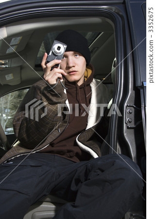 Teenager taking a picture. 3352675