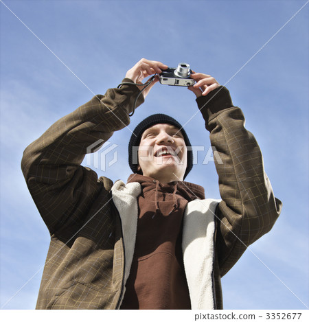 Teen taking picture. Teen taking picture. 3352677