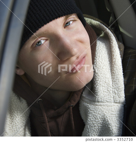 Teen with smirky expression. 3352710