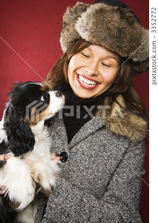 Woman holding dog. Woman holding dog. 3352772