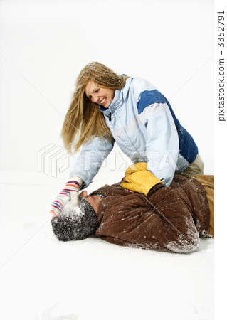 Young Couple Playing in Snow 3352791